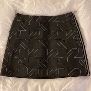 Black leather helmut lang skirt with white embroidered design size 0